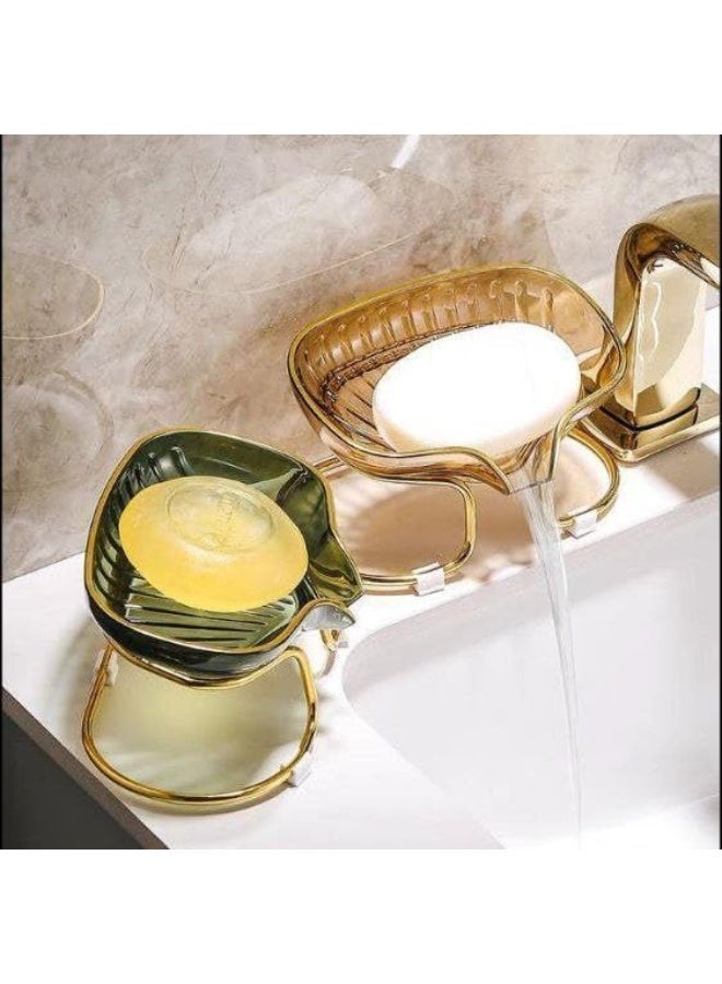 "High-quality transparent acrylic soap dish with an elegant golden metal stand that adds a luxurious decorative touch. Features an integrated drain to filter water and prevent accumulation. Suitable for kitchens and bathrooms (2 pieces) (Elc)." - Image 4